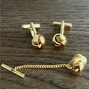 Vintage gold-tone cufflinks and matching tie clip set.  EUC